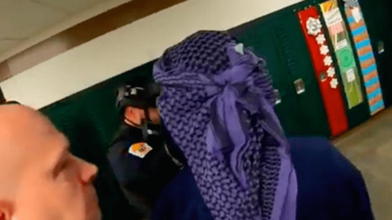 School Faces backlash after man wears Arab headscarf during safety drill